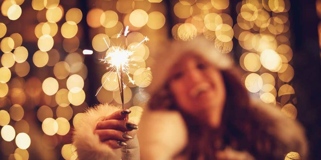 Fireworks, women's celebration, New Year's Eve, party, night, lights, festive, glamorous, festive mood, glamorous atmosphere, joy.